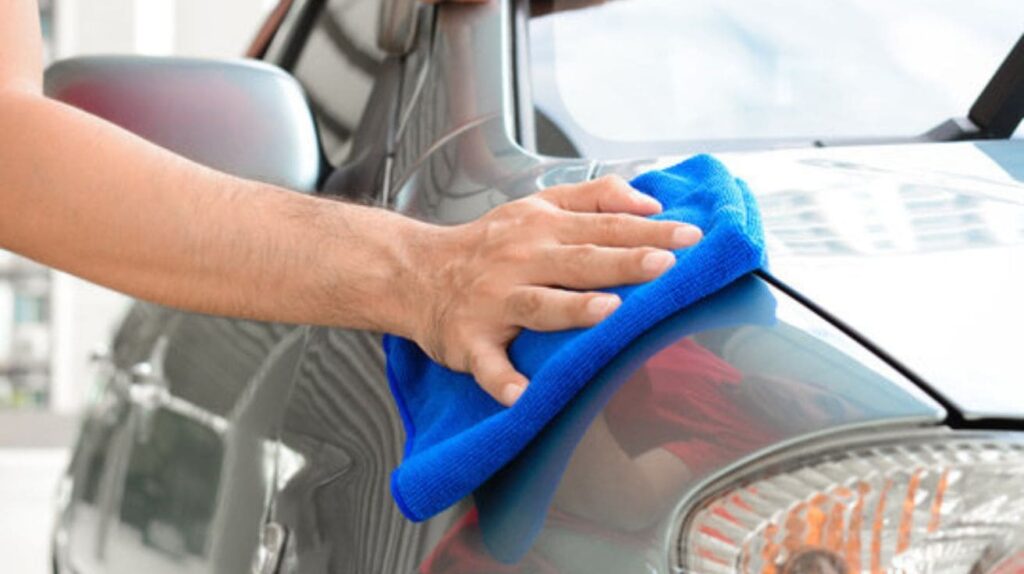 Gentle car cleaning products like microfiber towels and mild cleaners for washing a cracked windshield.