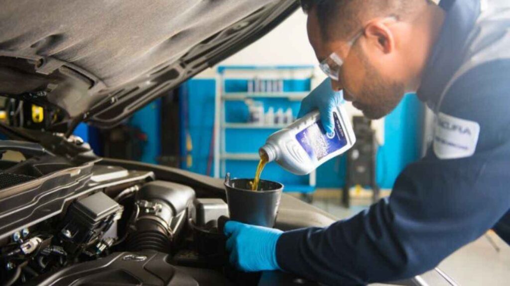 Classic car being serviced with high-mileage synthetic oil.