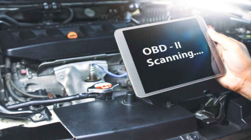 Using OBD-II scanner to diagnose car engine stalling issue.